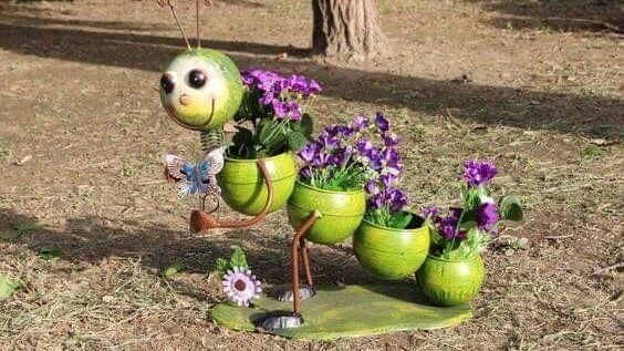 Caterpillar made from recycled pots etc